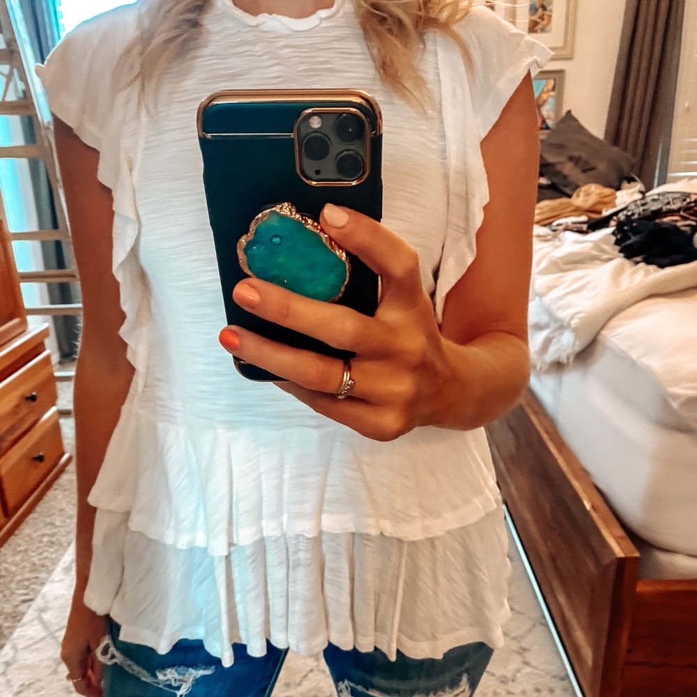 Ruffled white top